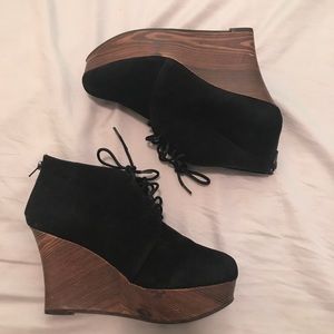 Faux suede and wood wedge bootie
